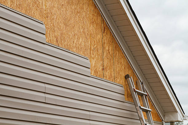 Professional Siding Replacement technician working in Millersville, MD
